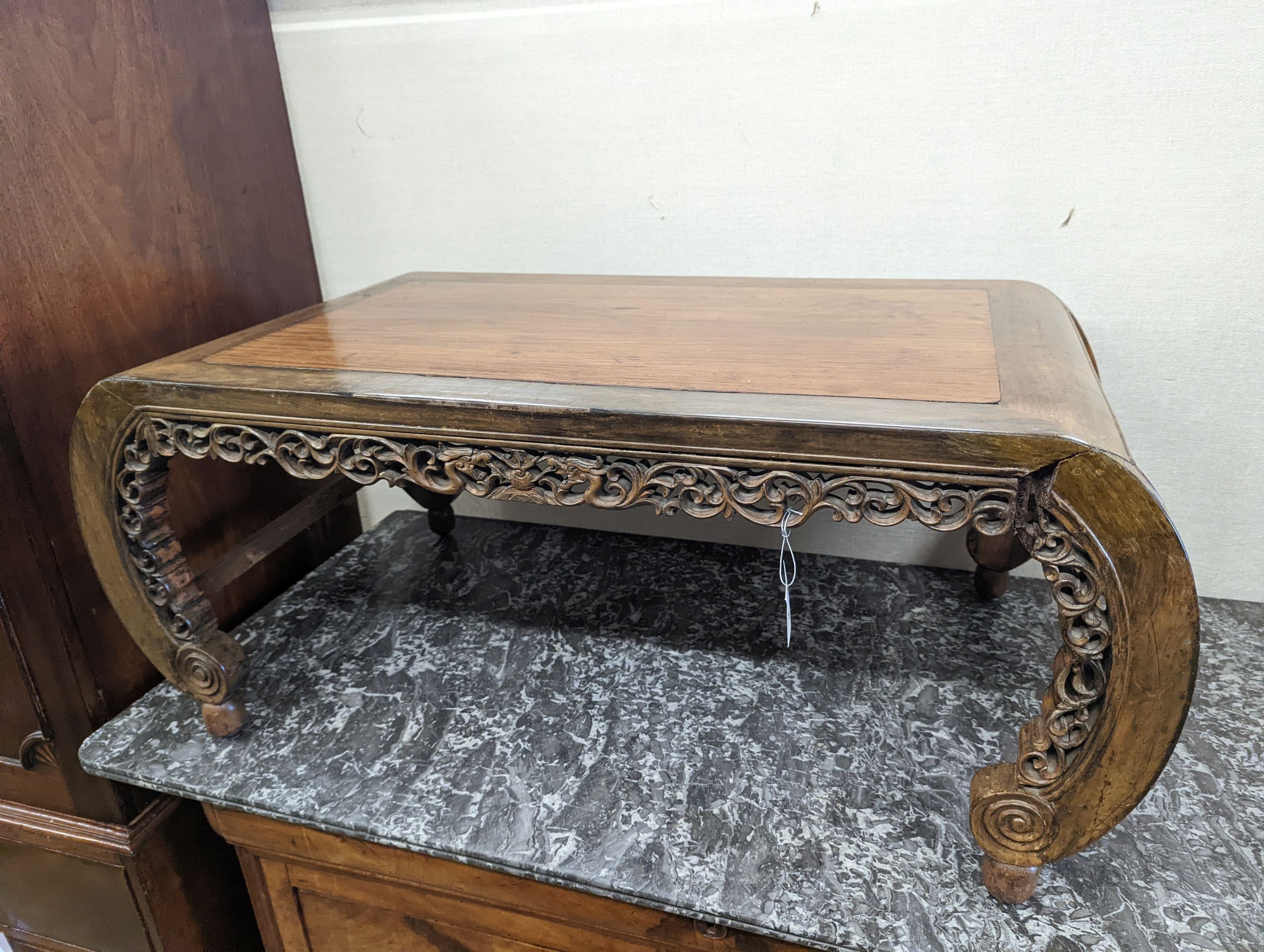 A Chinese rectangular carved hardwood low table, length 93cm, depth 49cm, height 39cm